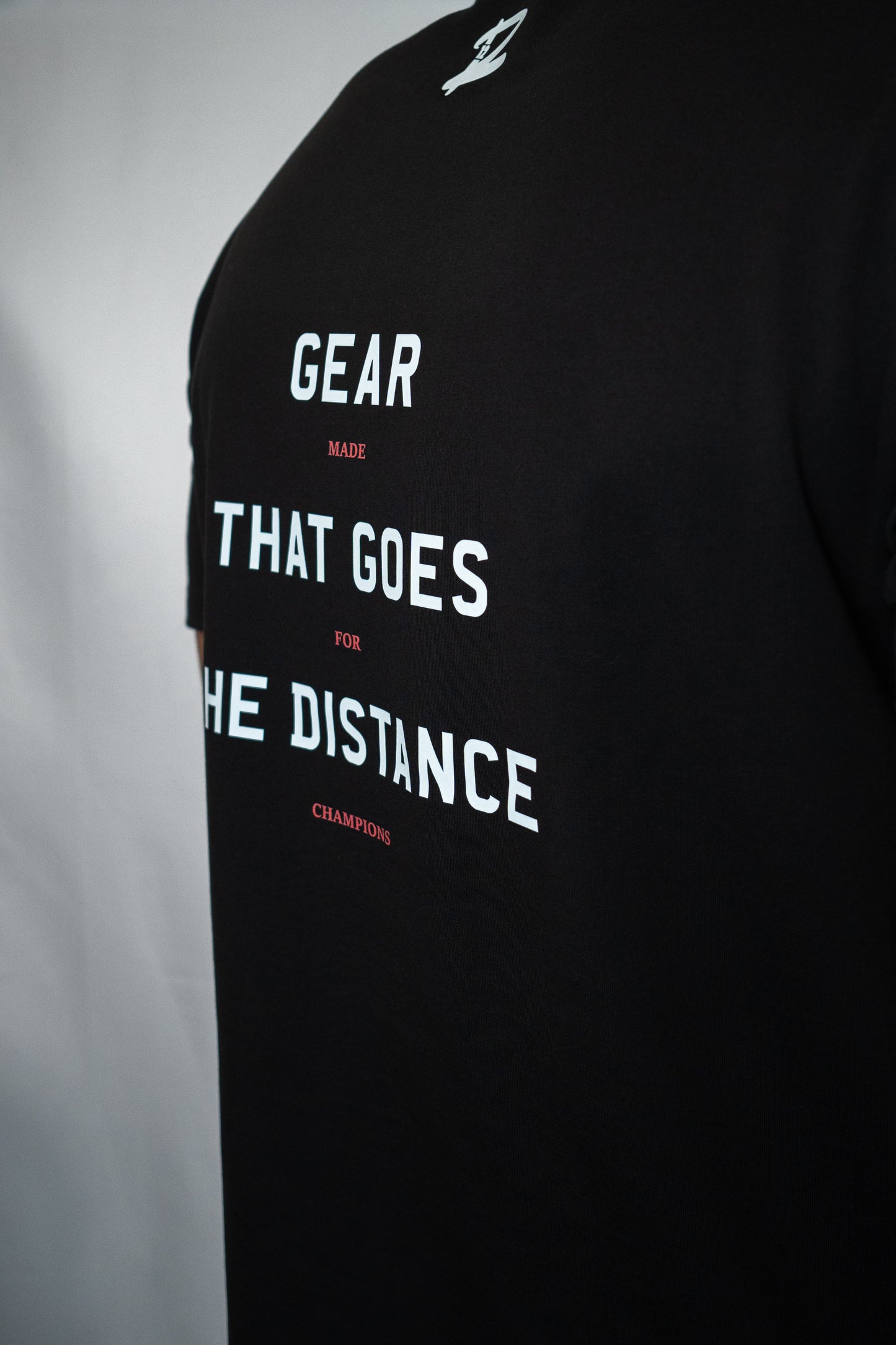 Gear That Goes The Distance Premium Oversized T-Shirt (Black)