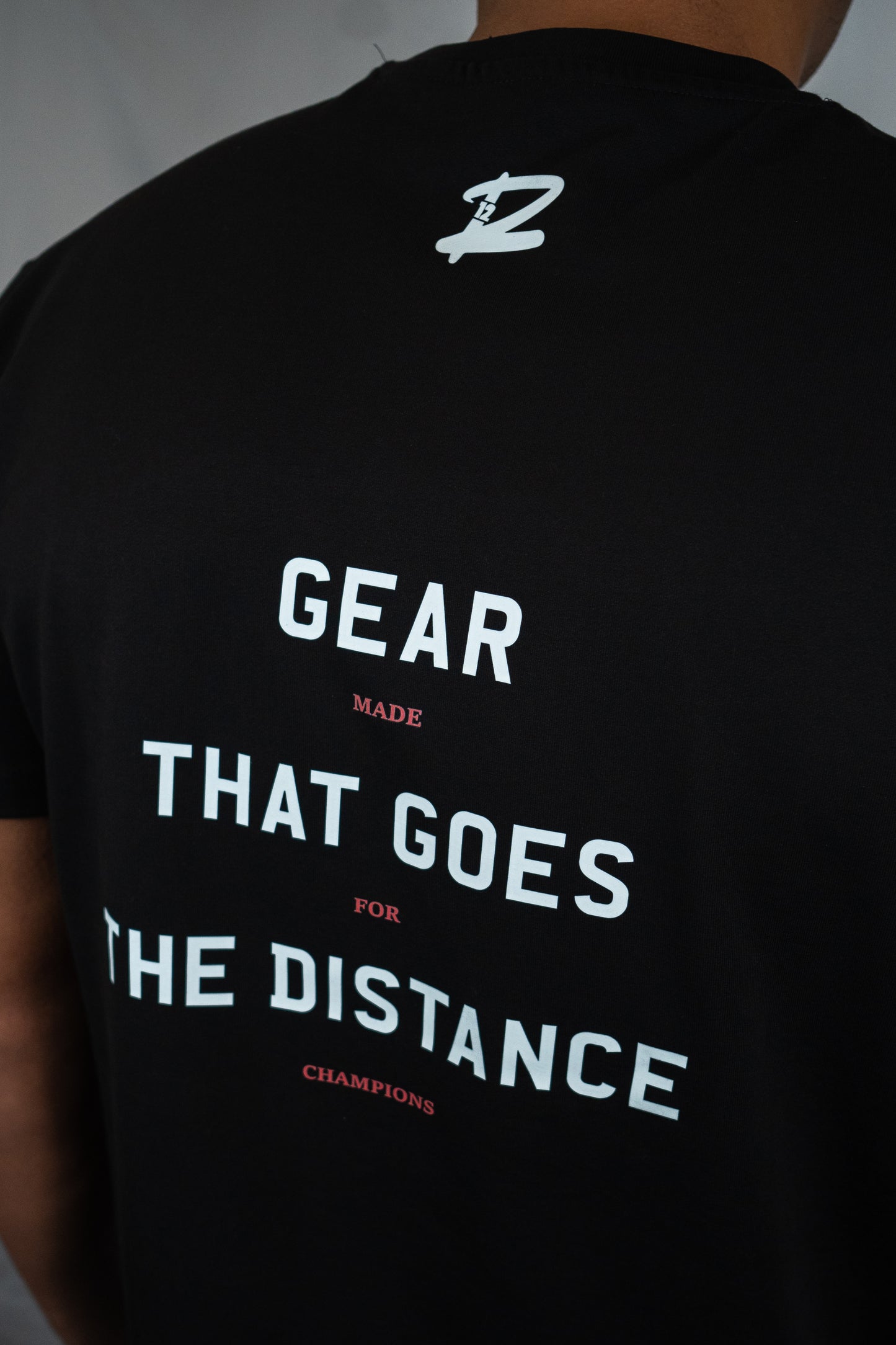 Gear That Goes The Distance Premium Oversized T-Shirt (Black)